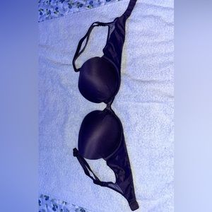 A dark purple 32d Victorious Secret bra.